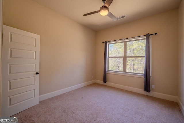 132 Windmeadow Way, Fayetteville, GA 30214 - spare room with visible vents, light carpet, baseboards, and ceiling fan