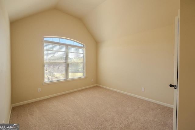 132 Windmeadow Way, Fayetteville, GA 30214 - carpeted spare room with baseboards and vaulted ceiling