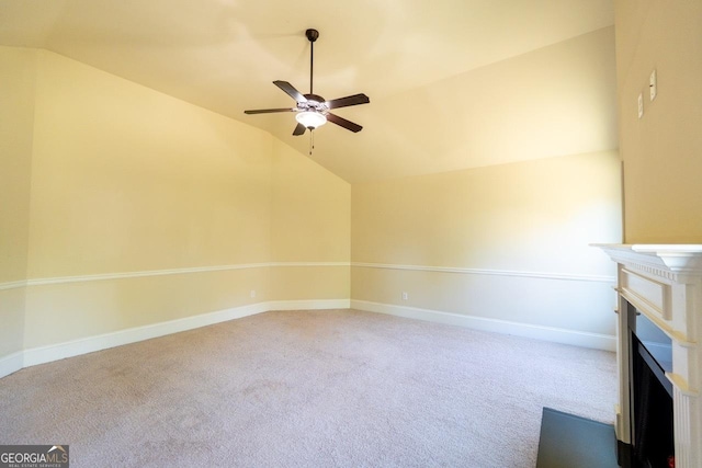 132 Windmeadow Way, Fayetteville, GA 30214 - unfurnished living room with vaulted ceiling, a ceiling fan, a fireplace, baseboards, and carpet