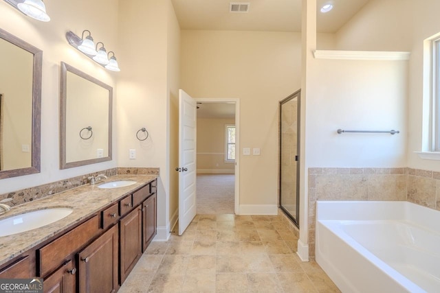 132 Windmeadow Way, Fayetteville, GA 30214 - bathroom featuring double vanity, visible vents, a sink, and a bath