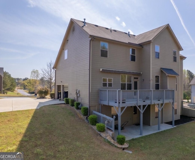 132 Windmeadow Way, Fayetteville, GA 30214 - rear view of house featuring a patio, an attached garage, concrete driveway, and a yard