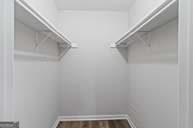 2199 Summertown Dr, Norcross, GA 30071 - spacious closet with dark wood finished floors