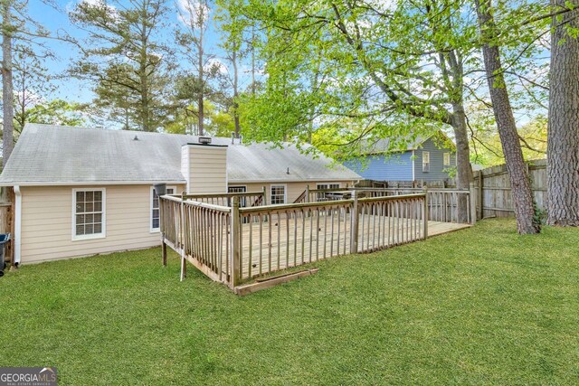 2199 Summertown Dr, Norcross, GA 30071 - rear view of house with a deck and a chimney