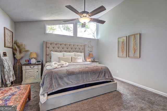 bedroom with carpet floors, baseboards, lofted ceiling, and a ceiling fan