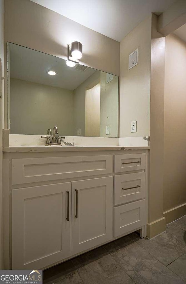 2048 Kelvin Dr, Lawrenceville, GA 30043 - bathroom featuring vanity and baseboards