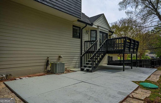 2048 Kelvin Dr, Lawrenceville, GA 30043 - view of property exterior featuring a patio and a wooden deck