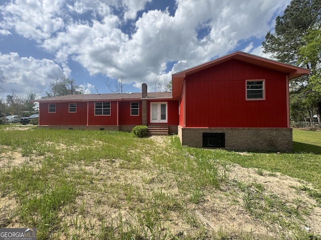 22 Spring Ave, Mcrae-Helena, GA 31055 - rear view of property with crawl space, french doors, entry steps, and a lawn