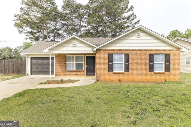 3 Joseph Rullo St, Hawkinsville, GA 31036 - single story home with a front lawn, a garage, brick siding, and concrete driveway