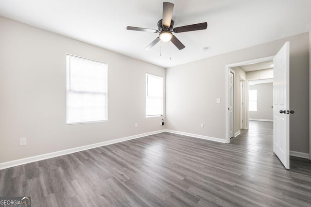 3 Joseph Rullo St, Hawkinsville, GA 31036 - unfurnished bedroom featuring attic access, dark wood-style floors, baseboards, and ceiling fan