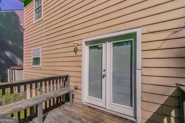 property entrance with a deck