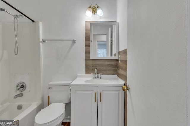 bathroom with bathing tub / shower combination, decorative backsplash, vanity, and toilet