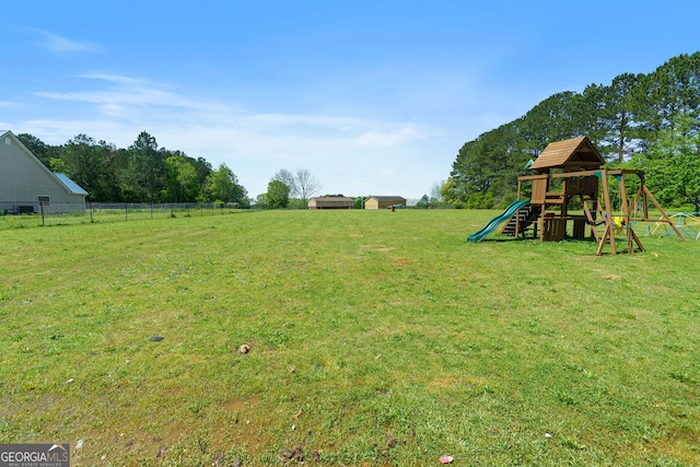 view of yard featuring a playground