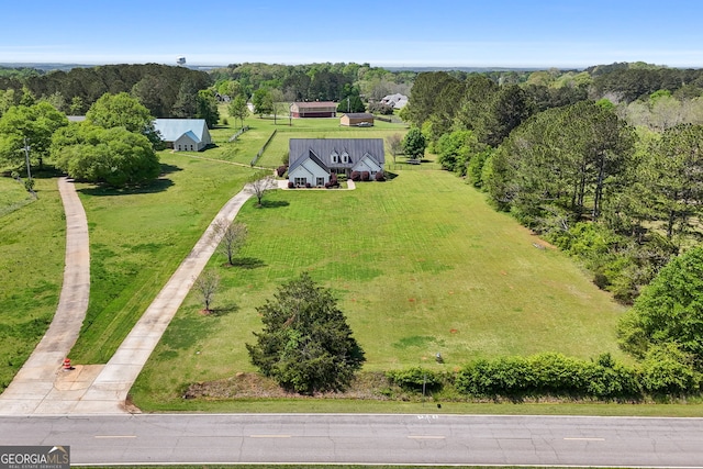 aerial view featuring a forest view