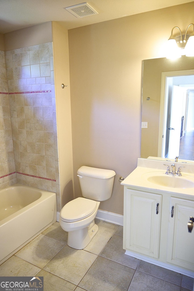 full bathroom featuring vanity, toilet, tile patterned floors, baseboards, and visible vents