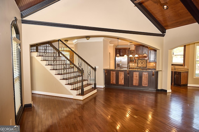 unfurnished living room featuring high vaulted ceiling, stairs, baseboards, wooden ceiling, and dark wood-type flooring