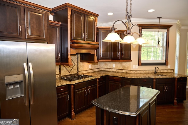 kitchen featuring dark wood finished floors, backsplash, premium range hood, and stainless steel appliances