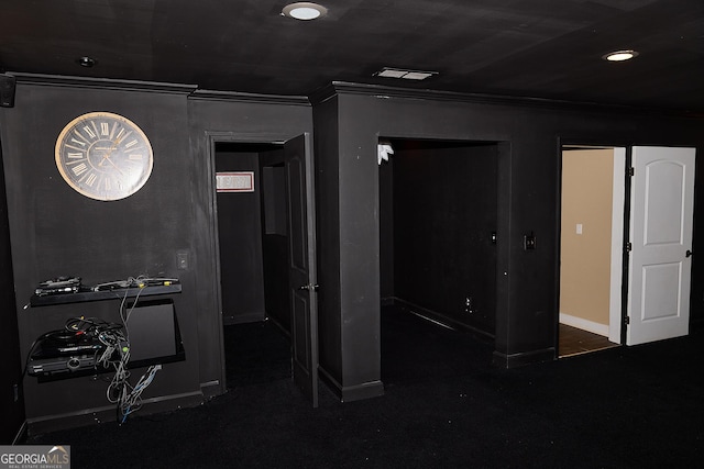 interior space featuring recessed lighting, baseboards, and ornamental molding