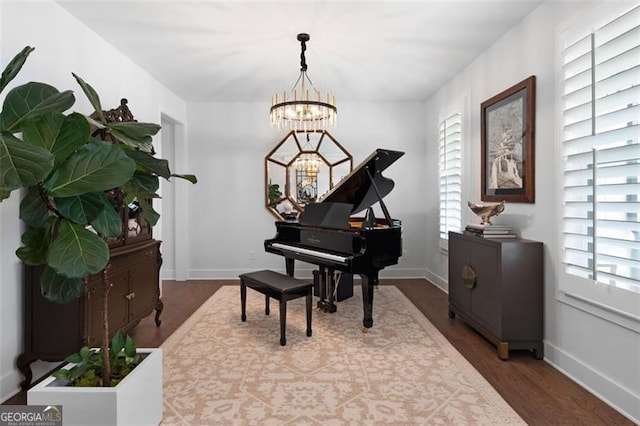 9 Grove Pointe Way, Cartersville, GA 30120 - living area with a chandelier, wood finished floors, and baseboards