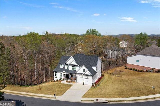 9 Grove Pointe Way, Cartersville, GA 30120 - aerial view of property and surrounding area featuring a heavily wooded area
