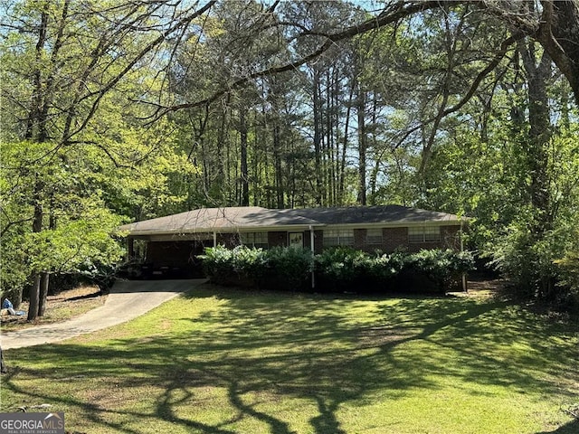 2903 Vogue Dr, Douglasville, GA 30134 - single story home with concrete driveway, a front yard, and an attached carport