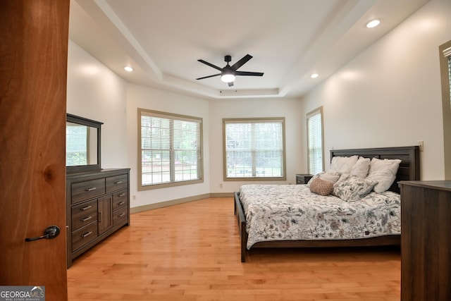 412 Trilium Trl, Pendergrass, GA 30567 - bedroom featuring a raised ceiling, light wood-type flooring, recessed lighting, baseboards, and ceiling fan