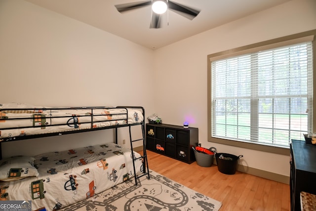 412 Trilium Trl, Pendergrass, GA 30567 - bedroom featuring light wood-style flooring and baseboards