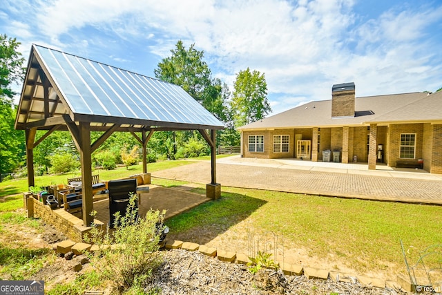 412 Trilium Trl, Pendergrass, GA 30567 - view of green lawn featuring a gazebo and a patio