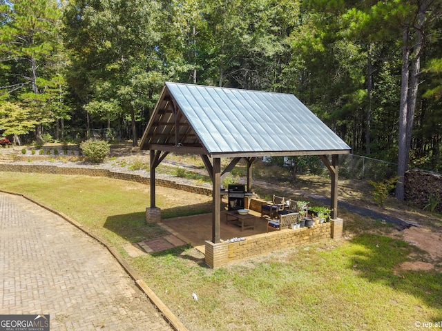 412 Trilium Trl, Pendergrass, GA 30567 - surrounding community with a gazebo, an outdoor hangout area, and a patio area