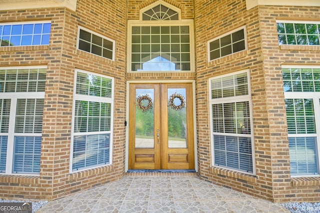 412 Trilium Trl, Pendergrass, GA 30567 - entrance to property with french doors and brick siding