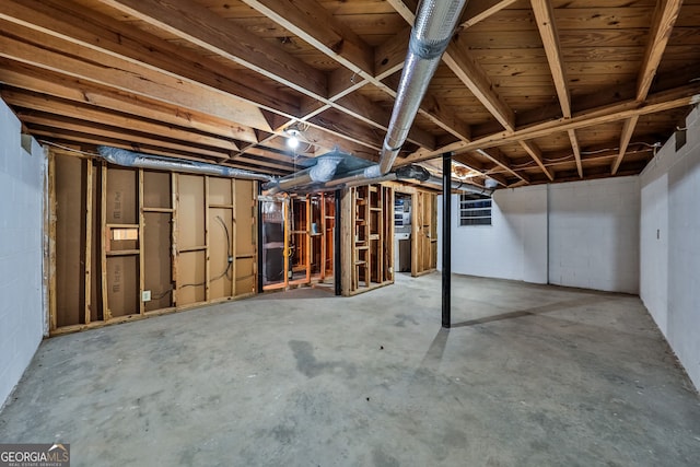 unfinished below grade area with concrete block wall