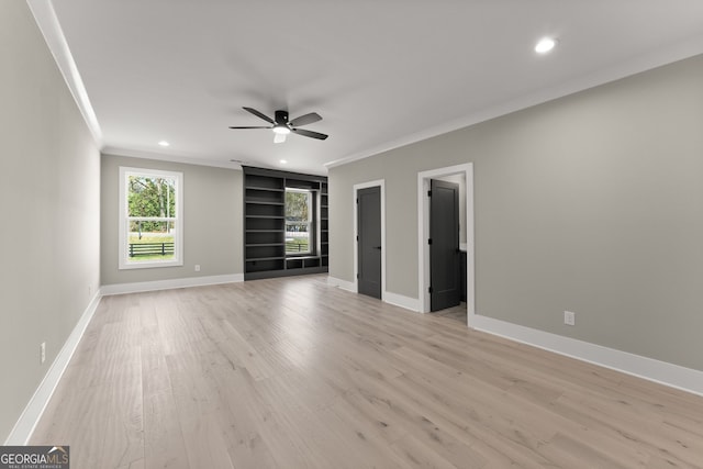 unfurnished bedroom featuring baseboards, light wood-type flooring, recessed lighting, and ornamental molding