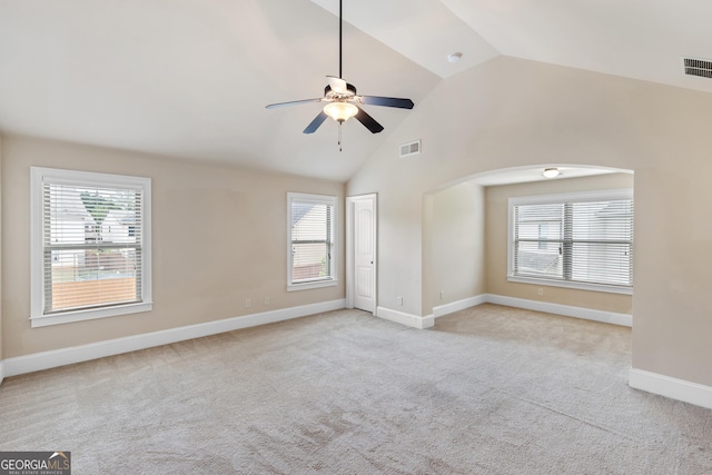 unfurnished living room with visible vents, ceiling fan, light colored carpet, and baseboards