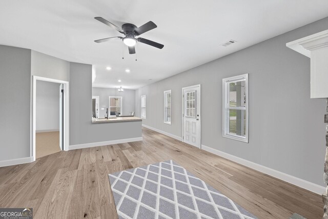 121 Tricias Way, Temple, GA 30179 - kitchen featuring a sink, dishwasher, open floor plan, ceiling fan, and dark brown cabinets