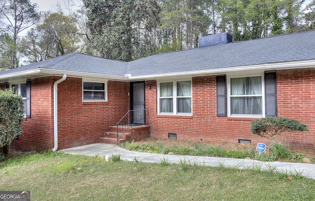 ranch-style home with brick siding, crawl space, and roof with shingles