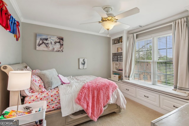 bedroom featuring ceiling fan, visible vents, crown molding, and light colored carpet