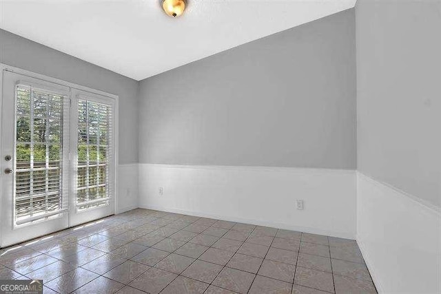 5219 Sweet Air Ln, Stone Mountain, GA 30088 - spare room with tile patterned flooring and baseboards