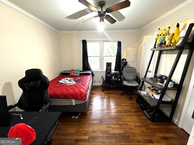 bedroom with wood finished floors, ceiling fan, and ornamental molding
