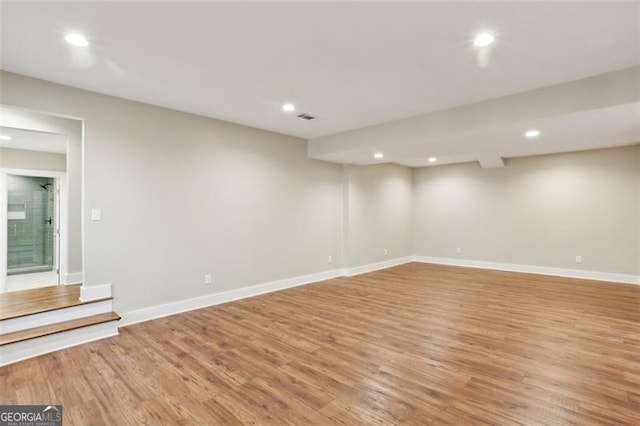 645 Trailmore Pl, Roswell, GA 30076 - below grade area with light wood-style flooring and recessed lighting