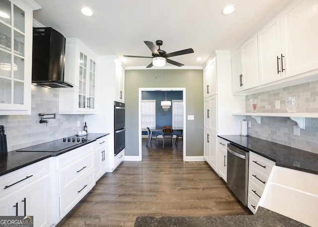 2587 Moons Grove Church Rd, Colbert, GA 30628 - kitchen with wall chimney range hood, stainless steel appliances, decorative backsplash, white cabinetry, and recessed lighting