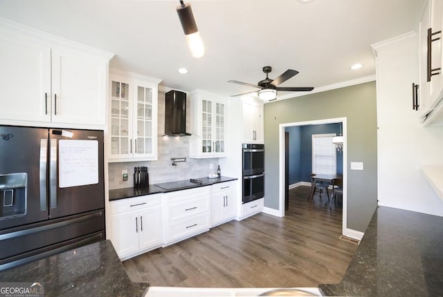 2587 Moons Grove Church Rd, Colbert, GA 30628 - kitchen featuring fridge with ice dispenser, wall chimney exhaust hood, black electric stovetop, double oven, and white cabinets