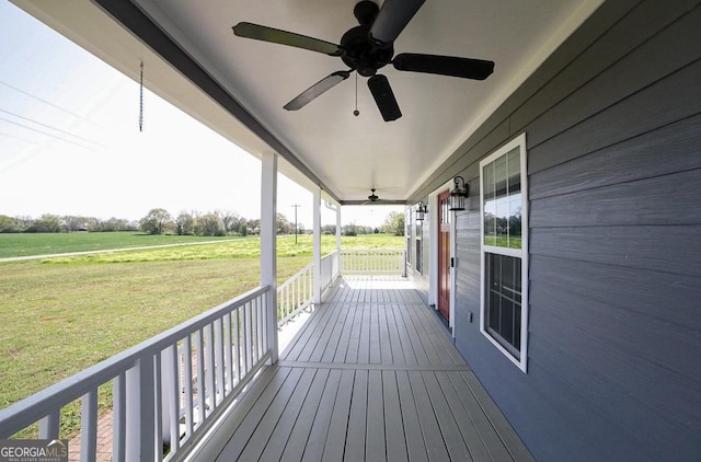2587 Moons Grove Church Rd, Colbert, GA 30628 - wooden porch featuring ceiling fan and a yard