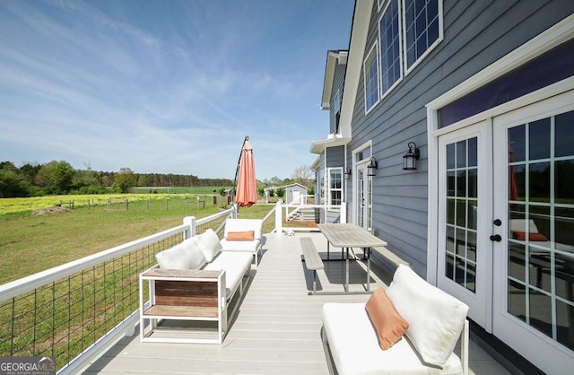 2587 Moons Grove Church Rd, Colbert, GA 30628 - wooden deck featuring an outdoor hangout area, a lawn, french doors, and a view of countryside