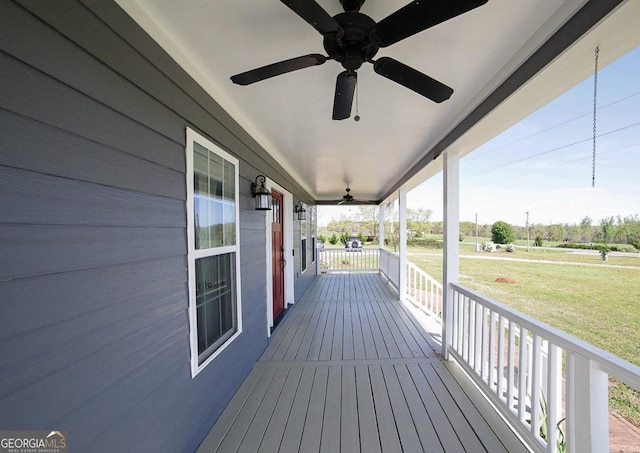 2587 Moons Grove Church Rd, Colbert, GA 30628 - porch with a ceiling fan and a yard