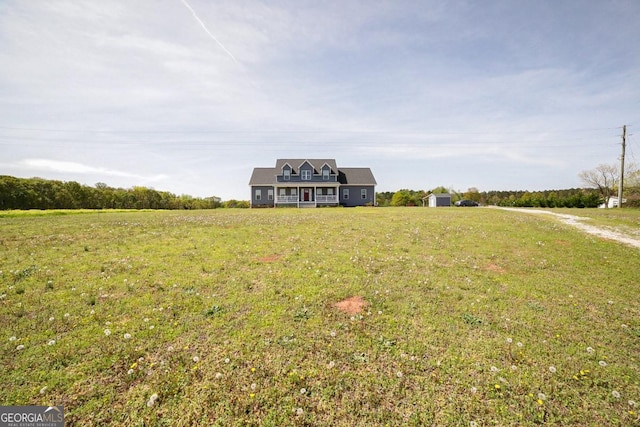 2587 Moons Grove Church Rd, Colbert, GA 30628 - cape cod home featuring a front lawn