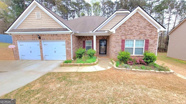 113 Citadel Dr, Hampton, GA 30228 - view of front facade with driveway, brick siding, a garage, a front yard, and a shingled roof
