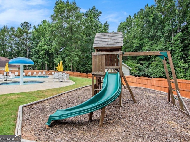 113 Citadel Dr, Hampton, GA 30228 - view of jungle gym featuring a community pool, a patio, and view of scattered trees