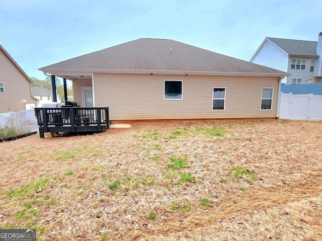 113 Citadel Dr, Hampton, GA 30228 - rear view of property with a wooden deck and a fenced backyard