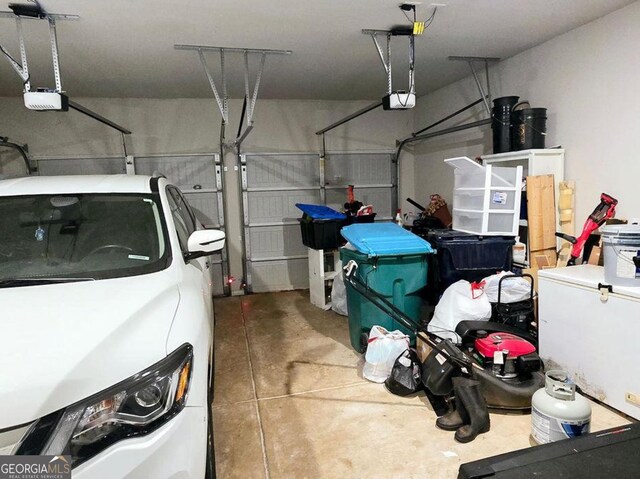 113 Citadel Dr, Hampton, GA 30228 - garage featuring a garage door opener