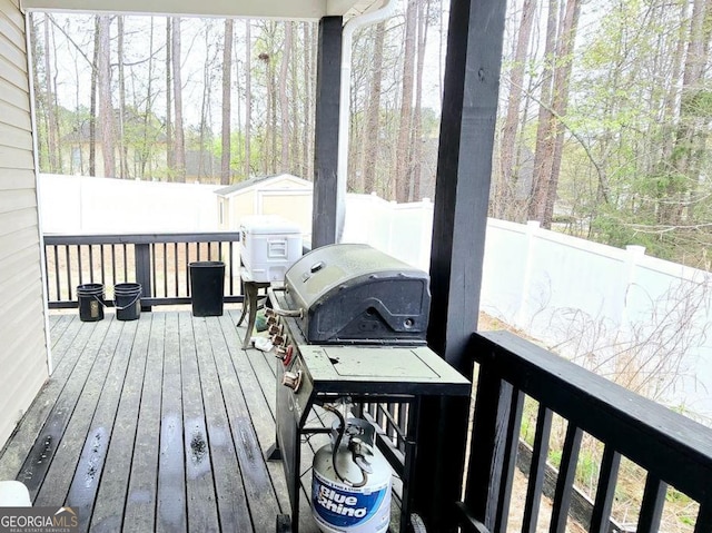 113 Citadel Dr, Hampton, GA 30228 - wooden deck with a storage shed and a fenced backyard