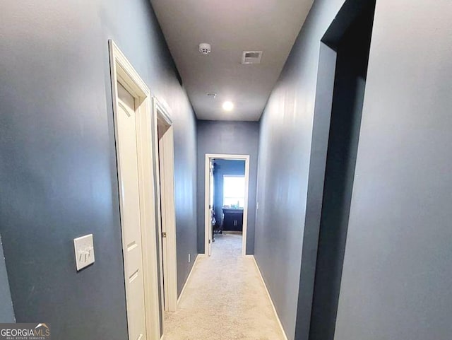 113 Citadel Dr, Hampton, GA 30228 - hallway featuring light colored carpet and baseboards